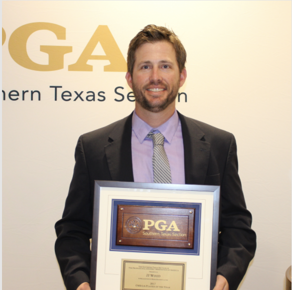 JJ Wood holding his South Texas PGA Player of the Year award